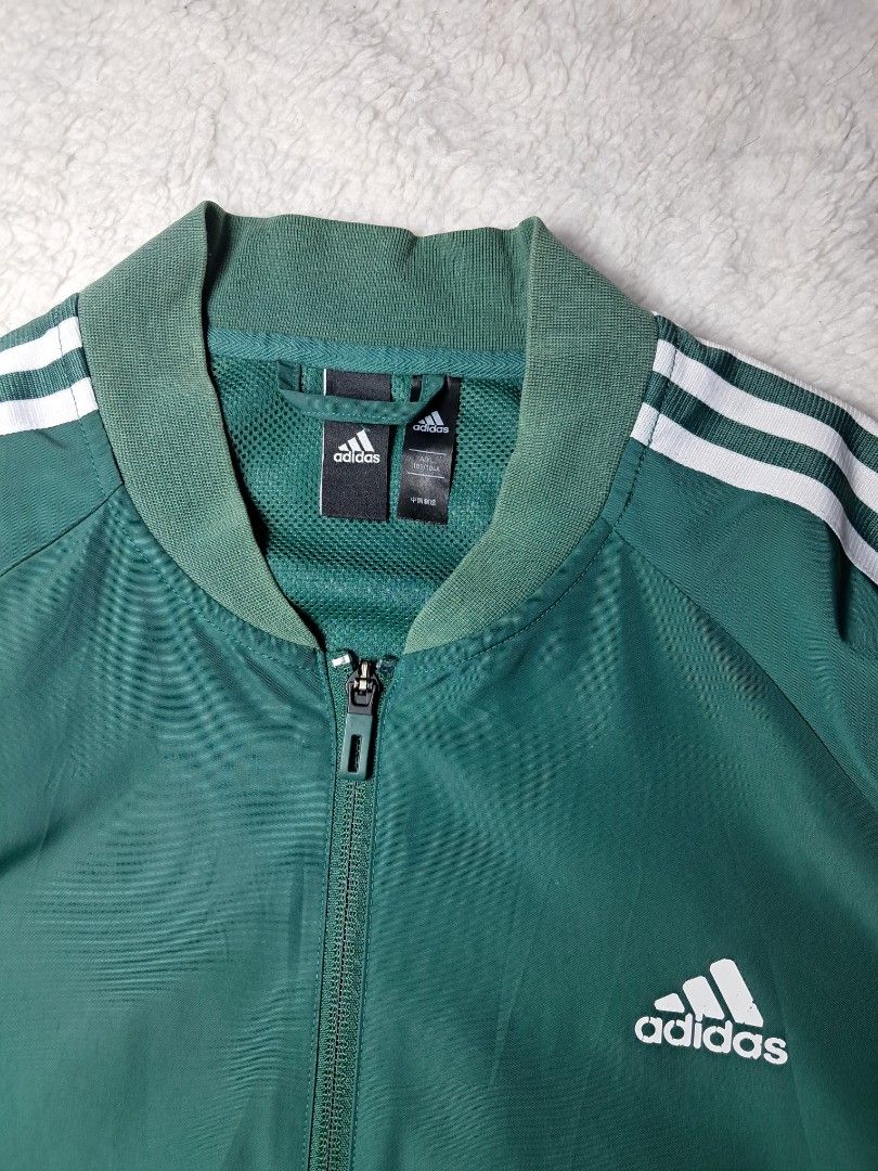 Adidas men's track jacket (Category: Coats, Jackets and Outerwear) located in Baguio. Submitted by mishmashfritz (Listing ID 1462850566, Image 2). Description: very good used condition, minimal stain, slight fade hem/ribbings front pockets, 1 pocket sa sleeve thrifted, large to xl.