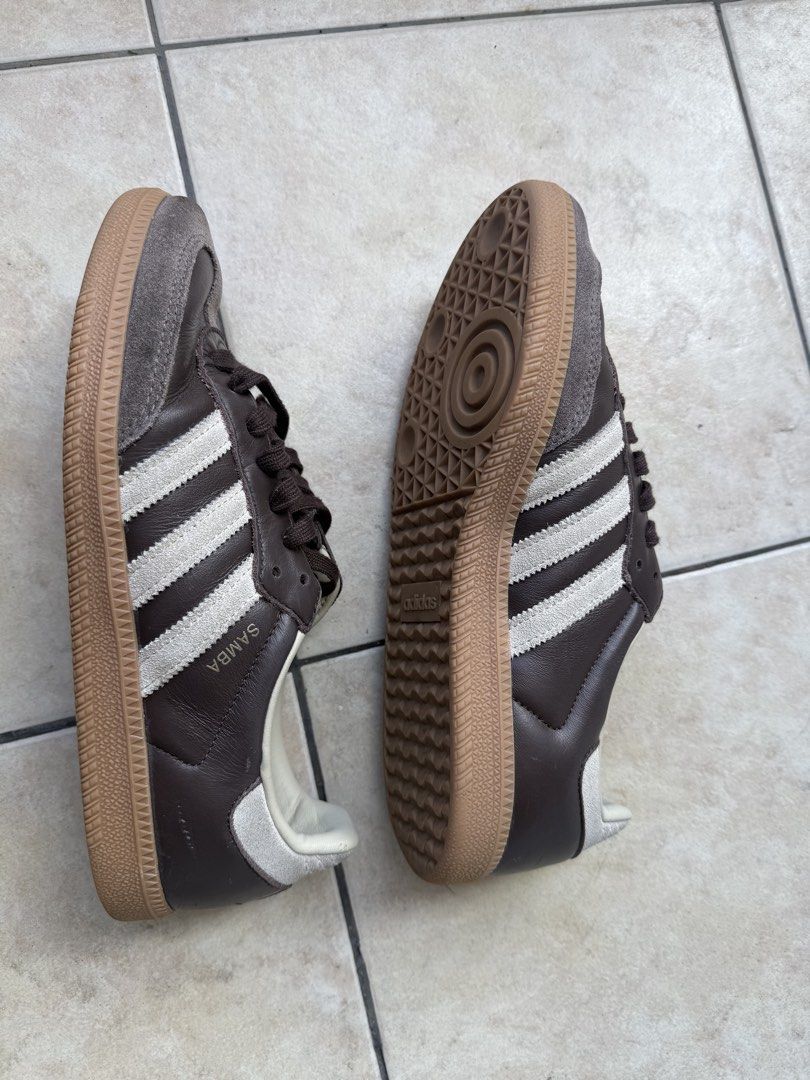 Adidas Samba Brown Leather Suede Sneakers (Category: Casual Shoes) located in Makati City. Submitted by lgramos1496 (Listing ID 1462685659, Image 2). Description: - Classic Adidas Samba sneakers - Brown leather with grey suede accents - Iconic white stripes on the side - Durable gum sole - Perfect for everyday casual wear RFS: not being used anymore Slight scratches on the leather heel Can meet up - podium - festival - sm aura Can ship via lbc - 