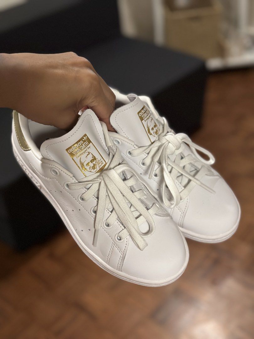 ADIDAS STAN SMITH (WOMEN’S) (Category: Sneakers) located in Paranaque City. Submitted by losangeles10 (Listing ID 1462840814, Image 2). Description: - Classic Adidas Stan Smith sneakers - White leather with gold accents (heel tab & tongue) - Iconic perforated 3-Stripes design - Lace-up closure - Ideal for everyday wear - A stylish staple for any wardrobe.