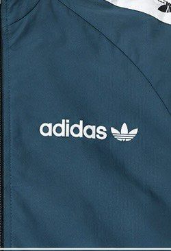 Adidas Track Jacket Teal with Trefoil Tape (Category: Coats, Jackets and Outerwear) located in Cabuyao City. Submitted by 0ld_souls (Listing ID 1462863573, Image 2). Description: - Classic teal Adidas track jacket - Iconic trefoil logo tape down the sleeves - Full zip closure - Front pockets - Great for casual wear or sports - Sharp, stylish look.