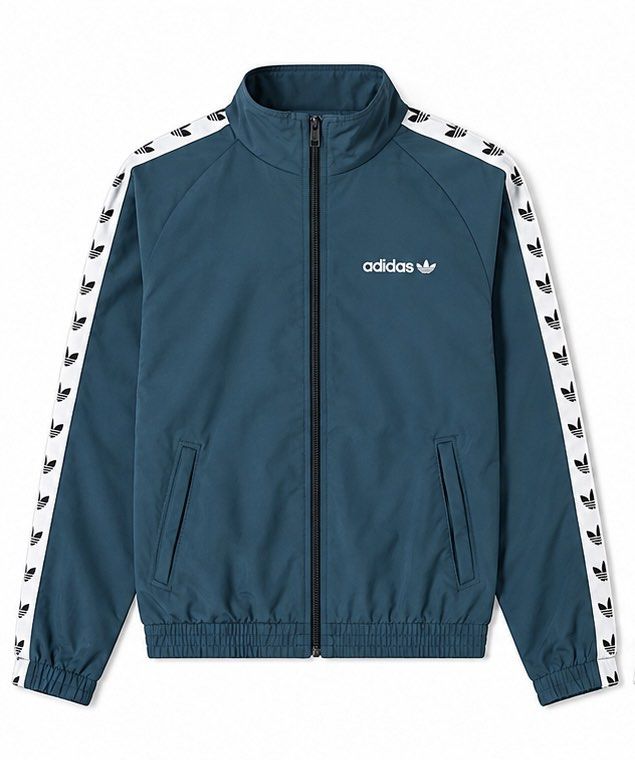 Adidas Track Jacket Teal with Trefoil Tape (Category: Coats, Jackets and Outerwear) located in Cabuyao City. Submitted by 0ld_souls (Listing ID 1462863573, Image 1). Description: - Classic teal Adidas track jacket - Iconic trefoil logo tape down the sleeves - Full zip closure - Front pockets - Great for casual wear or sports - Sharp, stylish look.