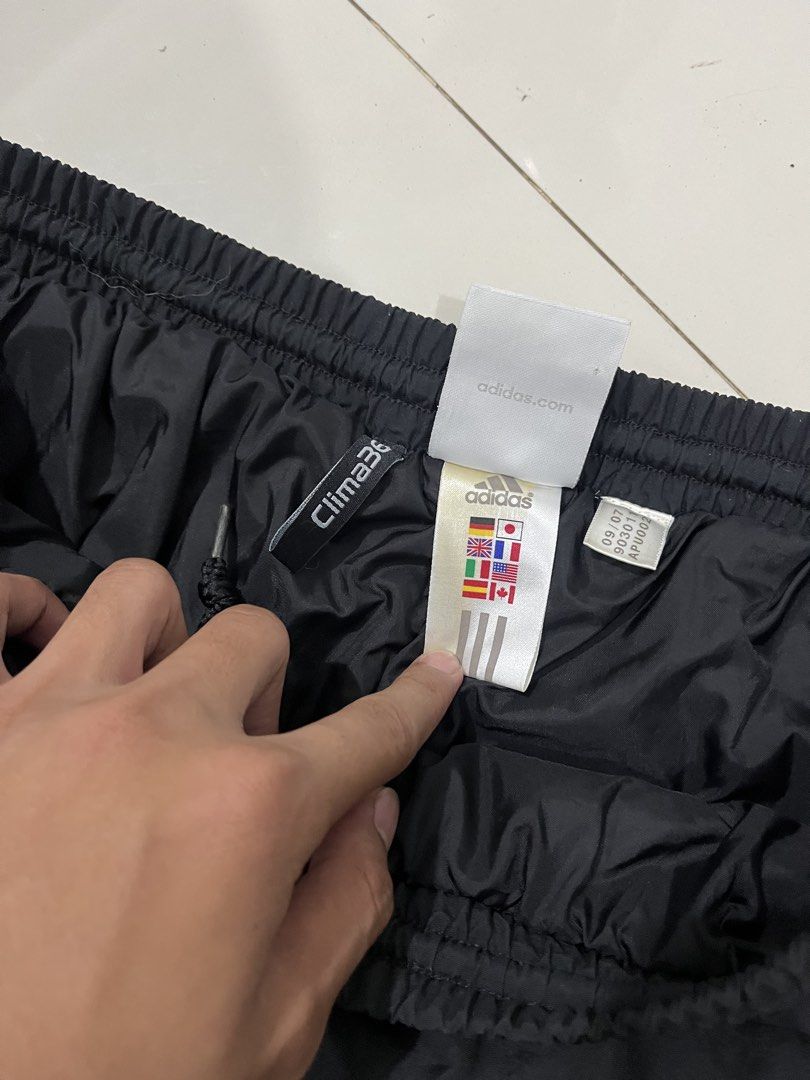 Adidas Track Pants (Category: Joggers) located in Manila. Submitted by kazuthrift (Listing ID 1462842142, Image 3). Description: Adidas Y2K double layered track pants Excellent condi No issue / need wash Size 30-36 Length 41 Leg opening 9 .