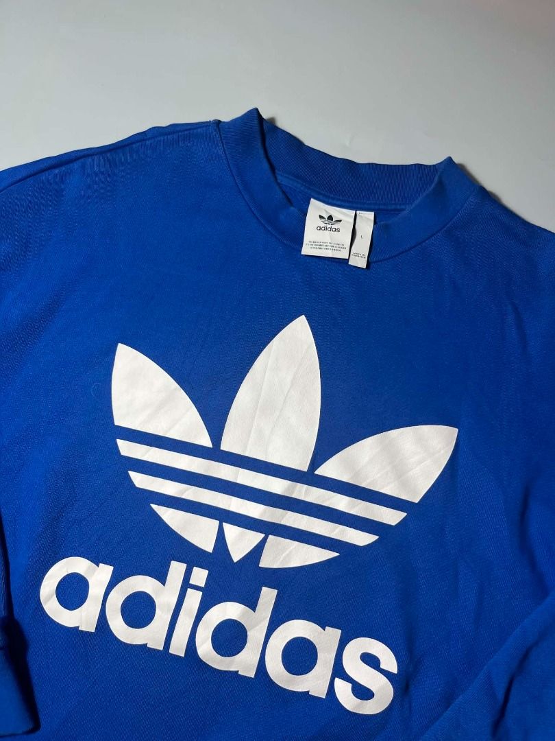 ADIDAS TREFOIL (Category: Coats, Jackets and Outerwear) located in General Santos City (Dadiangas). Submitted by arjay_genita (Listing ID 1462883044, Image 2). Description: Adidas TreFoil ‼️Size Large to XL (25/29) ‼️Excellent condition ‼️Color rate 9.5./10 ‼️No issue.