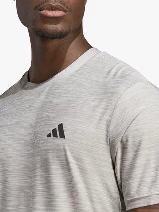 Adidas T-shirt XXL (Category: Activewear) located in Miagao. Submitted by juliusokra (Listing ID 1462850561, Image 2). Description: - Grey Adidas training top - Size XXL - Short sleeves, crew neck - Features Adidas logo on chest and sleeve - Made with Aeroready material for moisture-wicking.