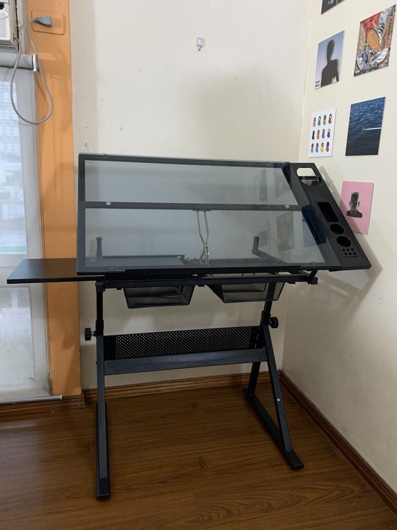 Adjustable Glass Drafting Table (Category: Stationery & School Supplies) located in Manila. Submitted by carms_declutter (Listing ID 1462842953, Image 2). Description: You can check in person if you want! Location: TAFT GOOD AS NEW DI MASYADO NAGAMIT KASI NAG SHIFT AKO .