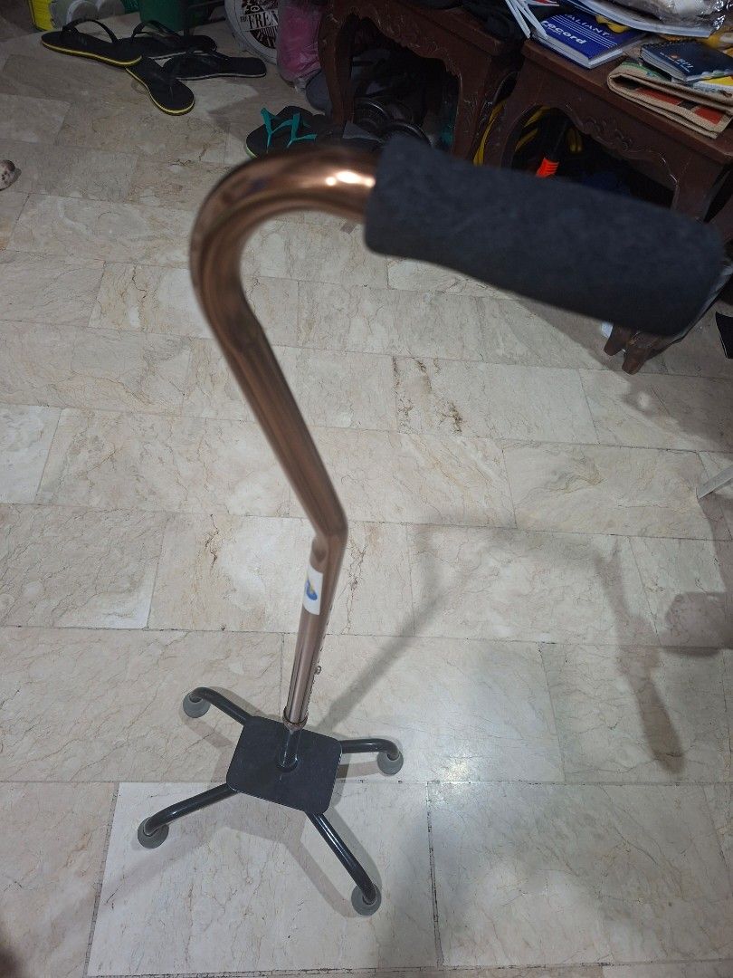 Adjustable Quad Cane with Padded Handle (Category: Medical Supplies & Tools) located in Manila. Submitted by d_of_olx (Listing ID 1462694205, Image 3). Description: - Sturdy quad cane for enhanced stability - Comfortable padded grip - Adjustable height for a personalized fit - Four-footed base for superior balance - Bronze-colored shaft - Excellent mobility support aid - free one more cane.