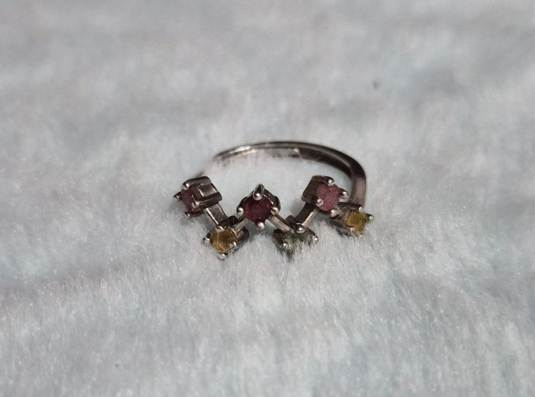 Adjustable Ring with Multi-Colored Tourmaline Stones size 6 up (Category: Rings) located in Mandaue City. Submitted by chuchi152615 (Listing ID 1462809697, Image 1). Description: - Adjustable band fits most finger sizes. - Unique, modern setting for the stones. - Great for stacking with other rings. - Adds a pop of color to any outfit..