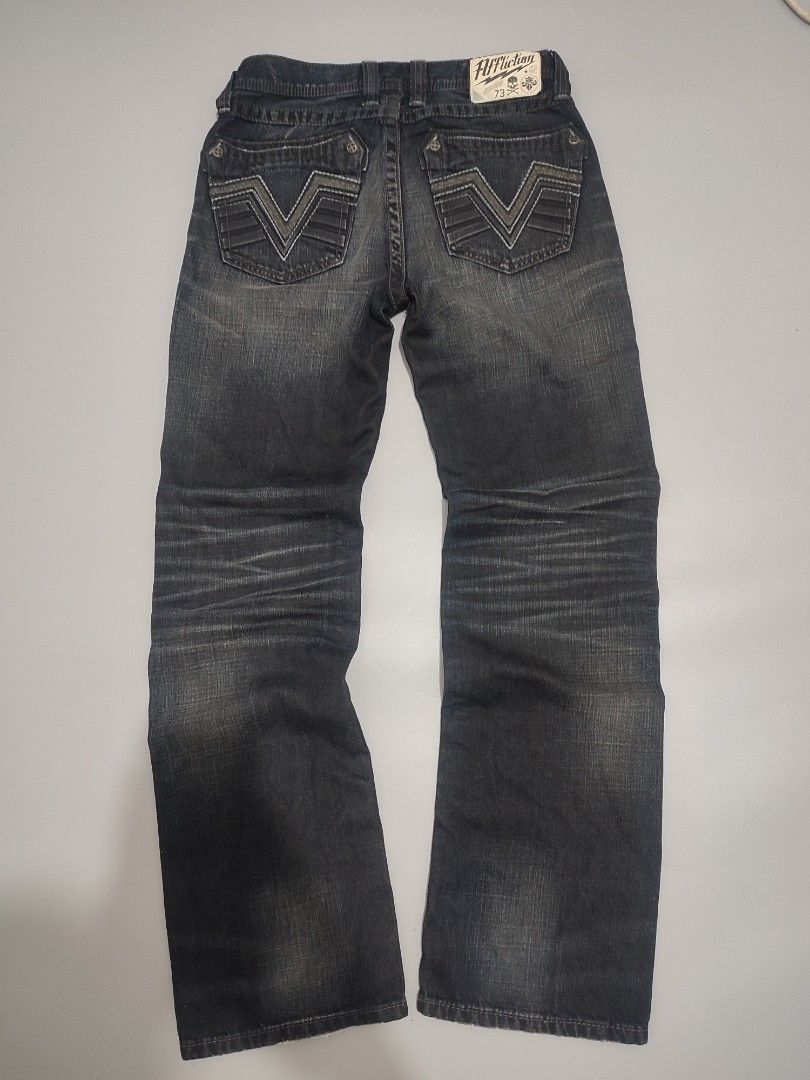 Affliction Jeans (Category: Jeans) located in Lipa City. Submitted by gudoys_outdoor16 (Listing ID 1462843509, Image 2). Description: - Brand: Affliction - Type: Dark Wash Denim Jeans - Size: 30 Waist - Length 41.5 - Features: Signature V-stitch detail on back pockets - Material: 100% Cotton - Style: Great for casual wear - Condition: Please check photos for exact look 2500 Only Free Shipping.