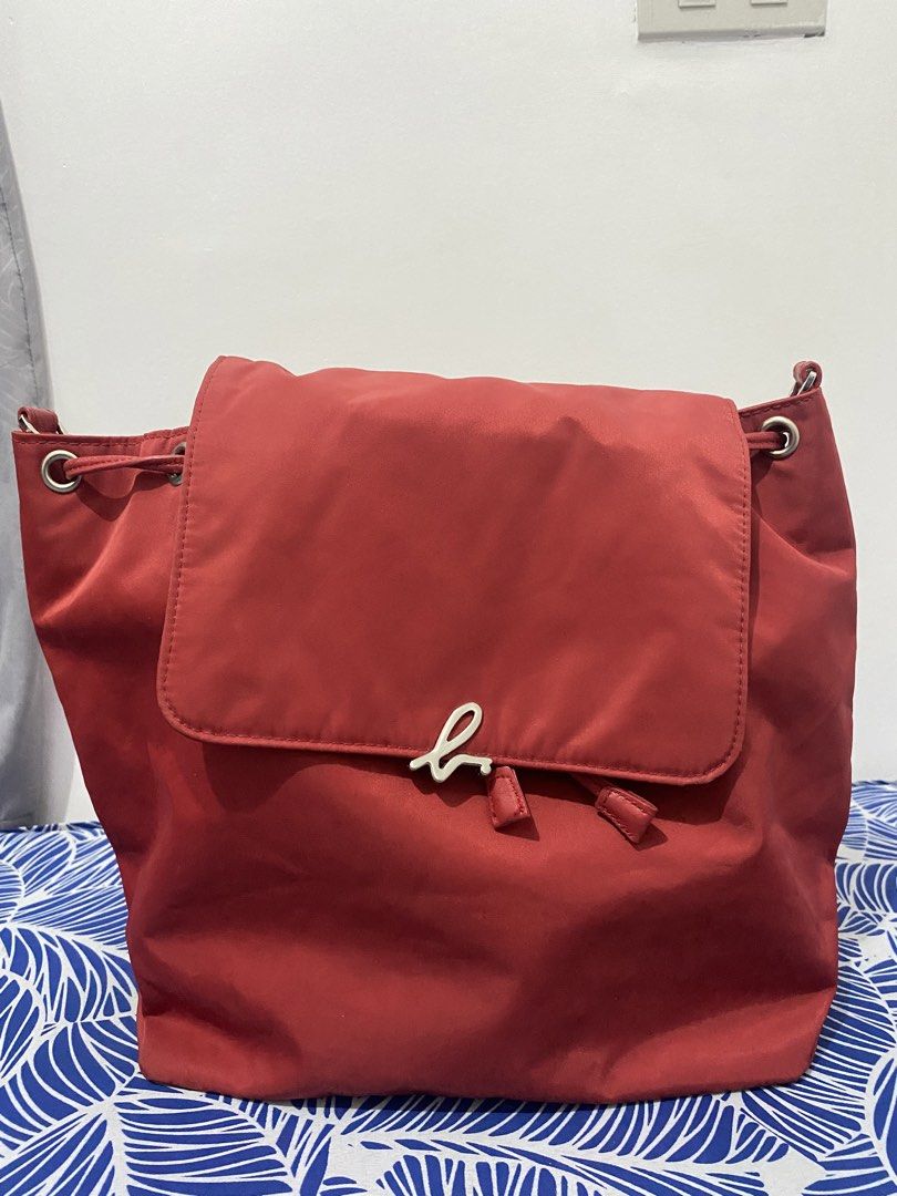 AGNES B (Category: Backpacks) located in Makati City. Submitted by swift_kateanziel (Listing ID 1462884836, Image 1). Description: Agnes B 9/10 condition Red nylon material Authentic Original price P19,000 Pm me!!.