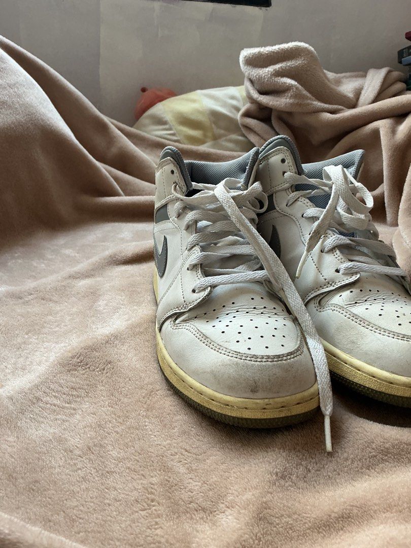 Air Jordan 1 Mid “Neutral Grey” (GS) (Category: Casual Shoes) located in Kawit. Submitted by yannazzz (Listing ID 1462714998, Image 2). Description: Air Jordan 1 Mid “Neutral Grey” (GS) - Original - Bought in Japan last 2023 - Colorway: White and Grey (Rare) - well used, but not that pudpod and sira - rfs: decluttering - still negotiable.