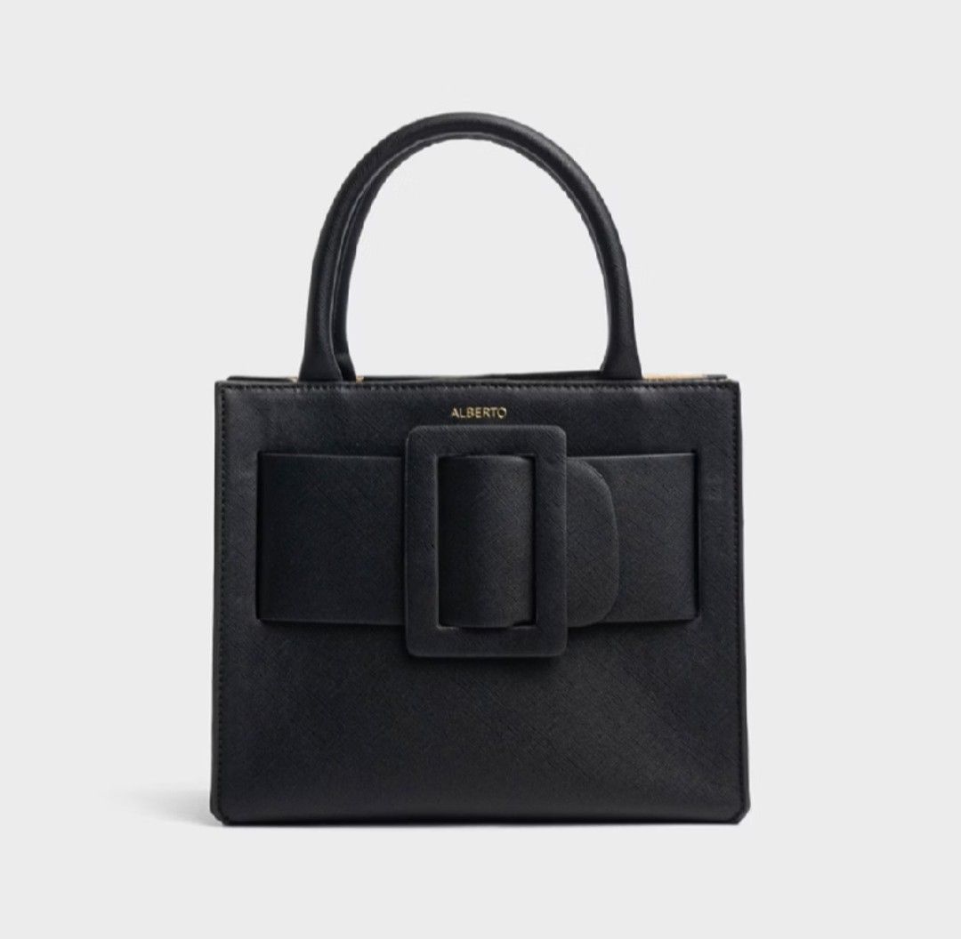 ALBERTO Hand Bag Prisma (Category: Tote Bags) located in Quezon City. Submitted by sclfxz (Listing ID 1462806959, Image 2). Description: Alberto Hand Bag Prisma Selling for ₱1,800 ONLY ✨ (Negotiable) 😊 Original Price at ₱2,499 💸 • This is a Store Bought Bag 💯 Get nyo na mga sisssyyy ☺️ Condition: Good as New 🫶🏻 Inclusions: - Body Strap - Dust Bag RFS: Decluttering Bags 🥹.