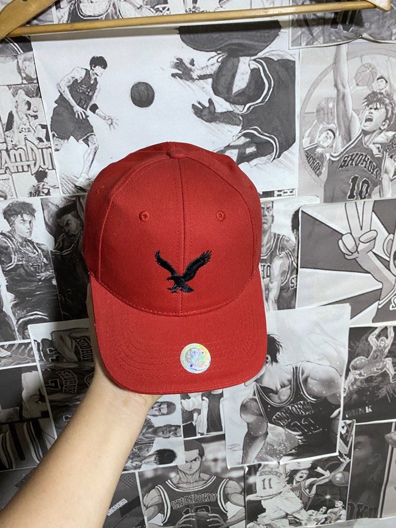 AMERICAN EAGLE RED CAP LOGO EMBROIDERY FRONT TO BACK LIKE NEW (Category: Caps & Hats) located in Polomolok. Submitted by SafeThrift (Listing ID 1462696304, Image 2). Description: AMERICAN EAGLE RED CAP LOGO EMBROIDERY FRONT TO BACK LIKE NEW NO ISSUES COMPLETE TAGS MADE IN TURKEY ADJUSTABLE STRAP 9.8|10 COLOR RATE ADULT FITS ALL.