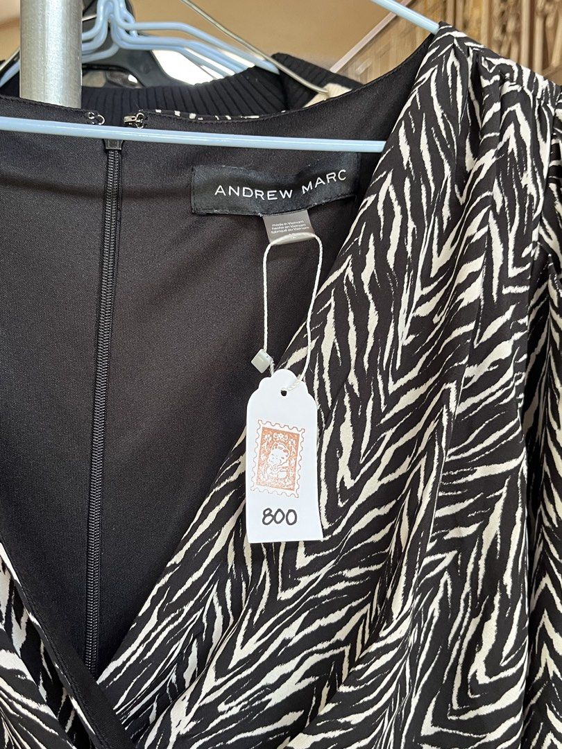 Andrew Marc Zebra Print Wrap Dress (Category: Dresses) located in Dinalupihan. Submitted by penaflorcj (Listing ID 1462705744, Image 3). Description: - Andrew Marc zebra print wrap dress - Midi length - Tie waist - 3/4 sleeves - Versatile for dressing up or down rfs: decluttering *sale price + discount when you buy more than 2 items.