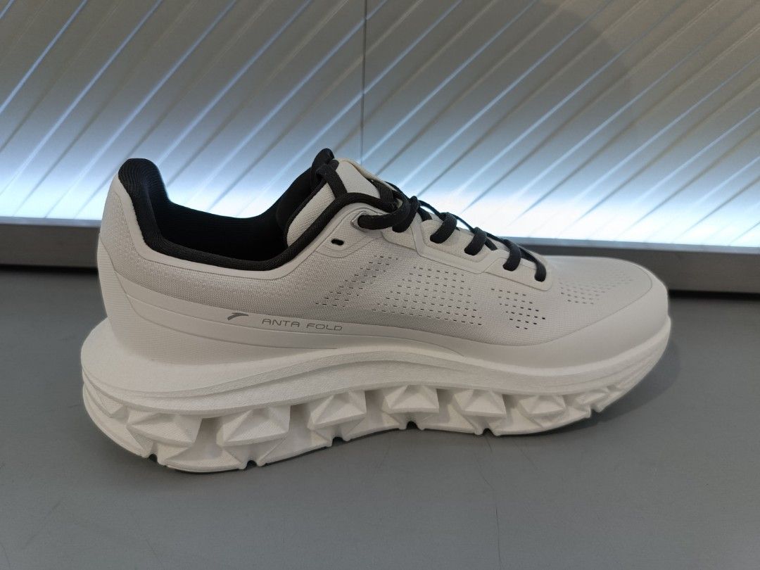 ANTA Fold Running Shoes (Category: Sneakers) located in Makati City. Submitted by sole_eater (Listing ID 1462847555, Image 3). Description: - White ANTA running shoes - Unique chunky sole design - Lightweight and breathable mesh upper - Secure lace-up closure - Ideal for running or everyday wear - Minimalist design with subtle branding.