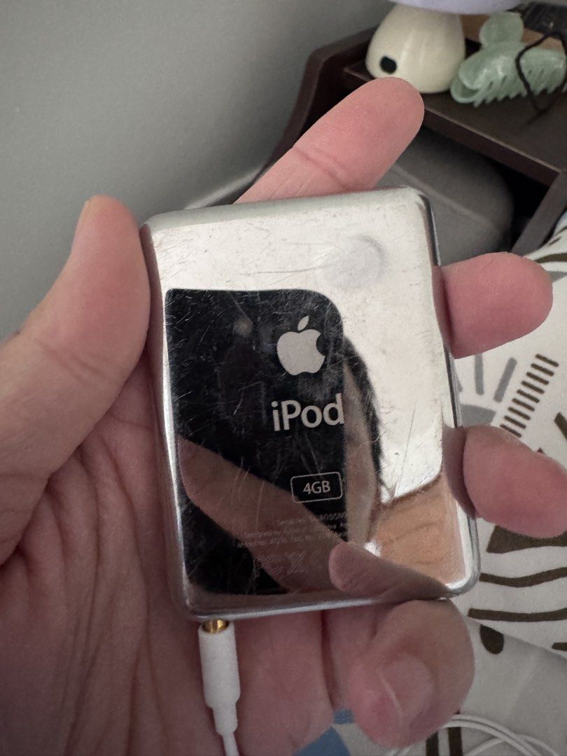 Apple iPod Nano 3rd Gen (4GB) (Category: Portable Music Players) located in San Fernando. Submitted by donnamr (Listing ID 1462696274, Image 3). Description: Hello! Selling my iPod Nano 3rd Gen (4GB) installed with 400 plus songs: - medyo malabo lang screen not sure if needs cleaning, pero can see naman ano nakasulat and display - good battery life, charged it 3 weeks ago, unused, naka lock lang, until now half battery pa - Working well with earp