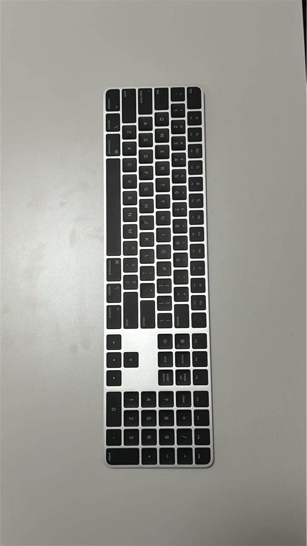 Apple Magic Keyboard with Touch ID and Numeric Keypad (Category: Computer Keyboard) located in Manila. Submitted by silentdog-a39d (Listing ID 1462842536, Image 3). Description: - Apple Magic Keyboard with Touch ID and Numeric Keypad - US English layout with black keys - Connects via Lightning cable - Ideal for Mac models with Apple Silicon - In perfect working condition.