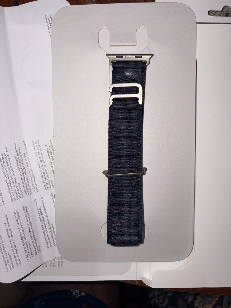 Apple Watch 49mm Black Alpine Loop Natural Titanium Finish (Category: Wearables & Smart Watches) located in Manila. Submitted by plastikos (Listing ID 1462860141, Image 2). Description: - Genuine Apple Watch Alpine Loop Band - Compatible with 49mm Apple Watch Ultra - Color: Black - Size: Large - Hardware Finish: Natural Titanium - Includes original packaging - Brand new and unused (just fitted) RFS: wrong size.