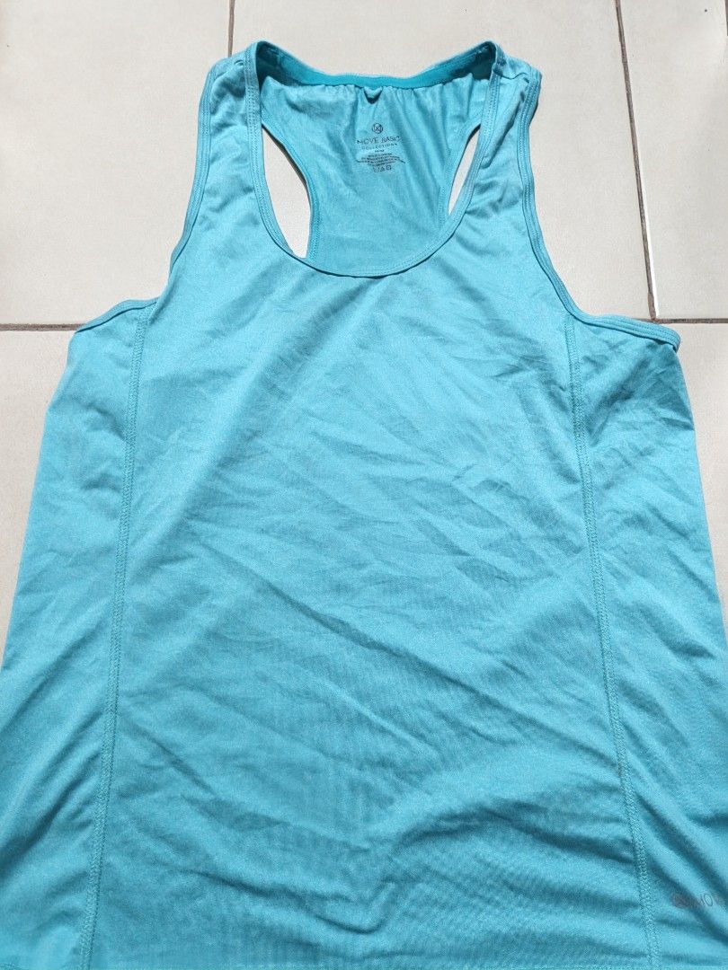 ARDENE MOVE BASIC COLLECTION ATHLETIC TANK TOP – SIZE M | ₱150. (Category: Activewear) located in Marikina City. Submitted by amari.stylesph (Listing ID 1462715763, Image 1). Description: 💙 ARDENE MOVE BASIC COLLECTION ATHLETIC TANK TOP – SIZE M | ₱150 Elevate your workout wardrobe with this stylish turquoise Ardene athletic tank top! Perfect for Zumba, yoga, gym sessions, running, or casual athleisure looks. ✨ Details: • Brand: Ardene – Move Ba
