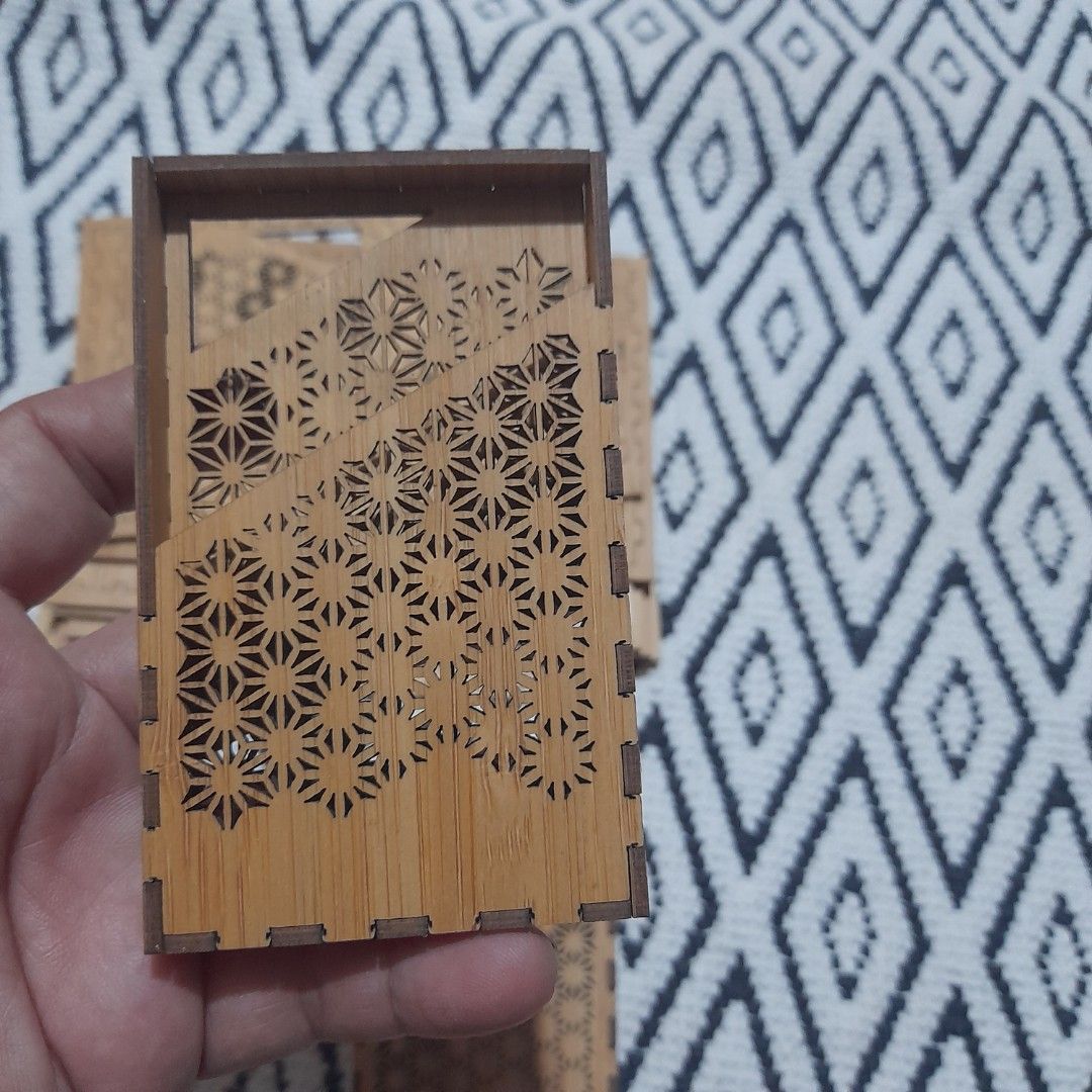 Assembled Japanese Bamboo Craft Card Case (Category: Everything Else Others) located in Bocaue. Submitted by marajapansurplus (Listing ID 1462826092, Image 2). Description: - Unassembled Bamboo Card Case - Made from natural wood with laser-cut geometric patterns - All pieces included for assembly - Ideal for crafting projects or as a unique storage solution .