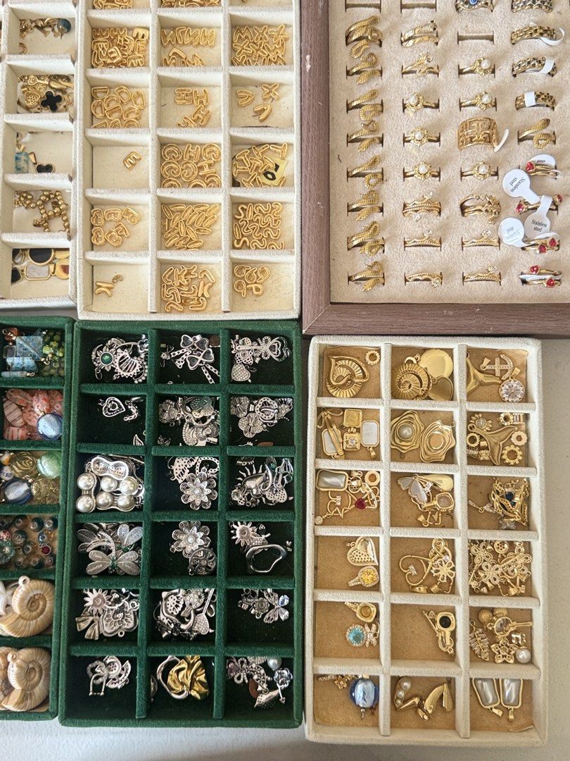 Assorted Gold and Silver Charms, Letters, and Rings (Category: Charms) located in Quezon City. Submitted by charmenella (Listing ID 1462689661, Image 2). Description: - Assorted jewelry making supplies - Includes gold alphabet letters - Various gold and silver charms - Assorted rings - All items neatly organized in trays - Sold as a bundle - Ideal for crafting or customizing jewelry More freebies as well slightly negotiable ALL BRAND NEW good for