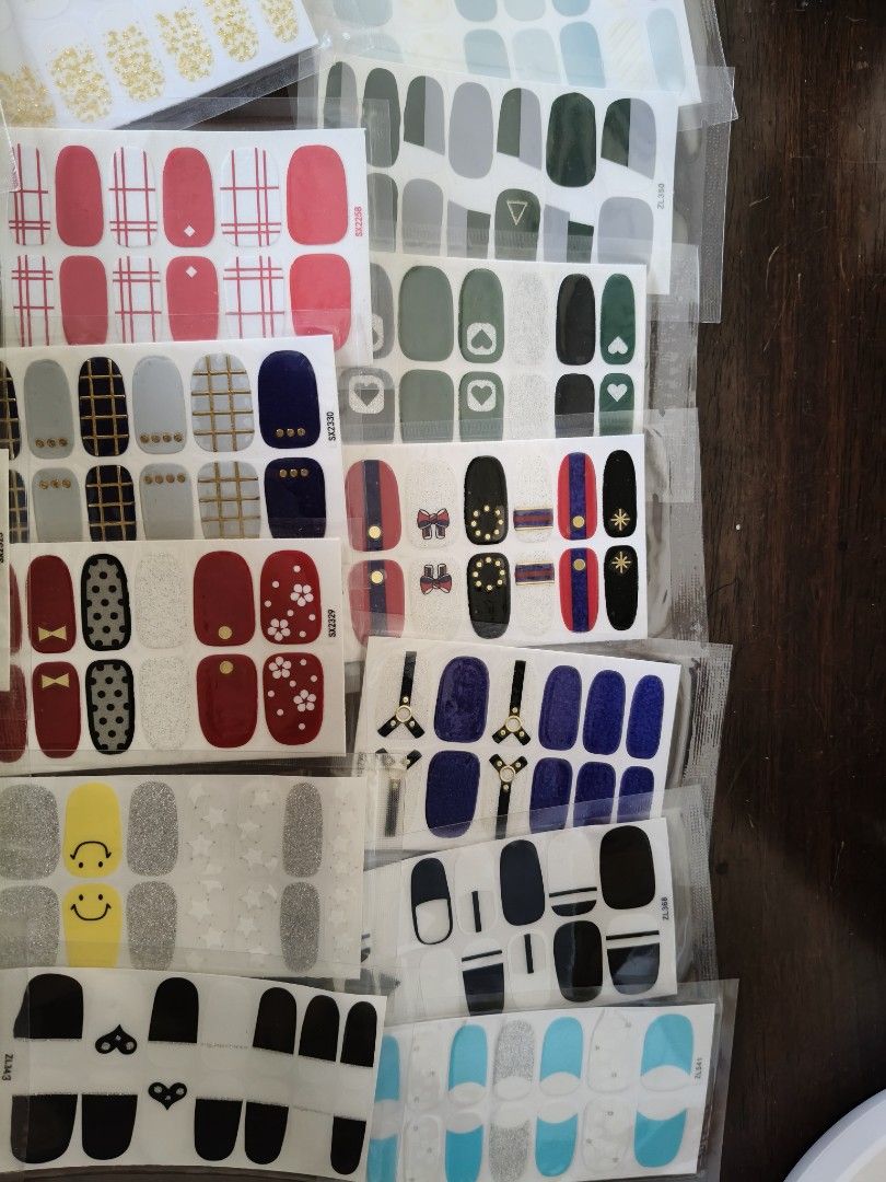 Assorted Nail Art Stickers - Various Designs & Colors (Category: Hands & Nails) located in Santa Rosa. Submitted by iammarien2nette (Listing ID 1462777488, Image 2). Description: - Huge variety of nail art sticker designs available. - Options range from glittery finishes to solid colors. - Super easy to apply for a quick and stylish manicure. - Perfect for experimenting with different nail looks. - Each sticker is individually packaged for conven