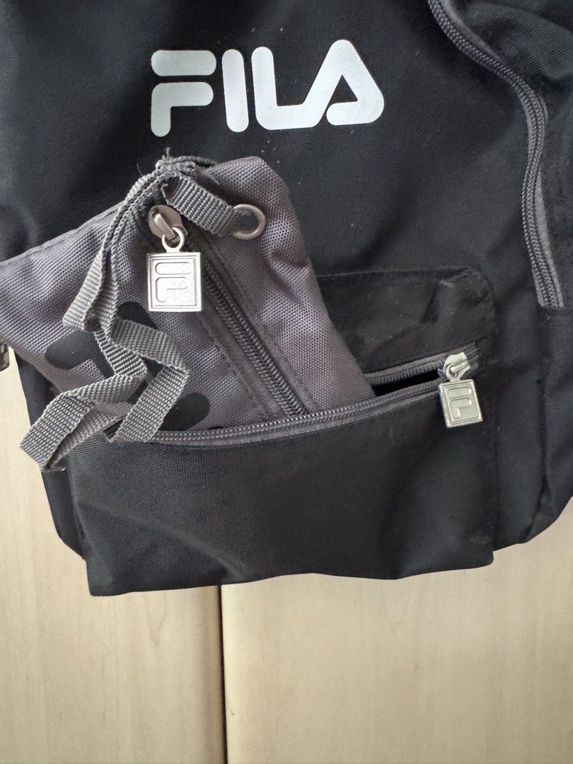 AUTH FILA SMALL BACKPACK BAG (Category: Backpacks) located in Pasig City. Submitted by babyiceice (Listing ID 1462704613, Image 3). Description: NO MEETS UPS***NO TRADES***NO WHEN WORN PICTURE***NO MEASUREMENTS PLS READ THE DESCRIPTION CAREFULLY AND LOOK AT THE PICTURES POSTED, NO COMPLAINTS OR REFUND WILL BE ENTERTAINED WITH ANY OF THE FLAWS POSTED OR PICTURED. ALL SALES FINAL NO RETURN NO EXCHANGE NO REFUND BUYER PAYS SHIPPING FEE 100 PESOS — M