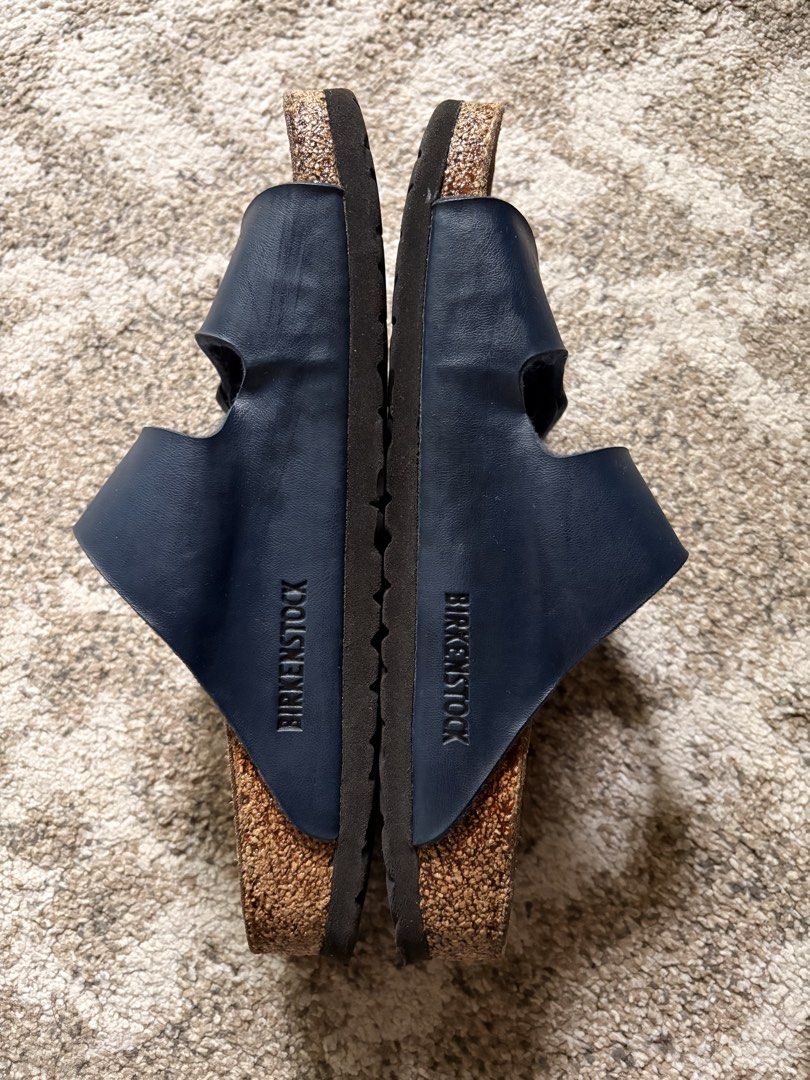 Auth Preloved Arizona Birkenstock (Category: Slippers and slides) located in Paranaque City. Submitted by silentstone.dolphin (Listing ID 1462776780, Image 3). Description: Classic Blue Color.. Visible Print.. Size 38N.. Clean & Ready to Wear.. Super Nice in Actual😍 .