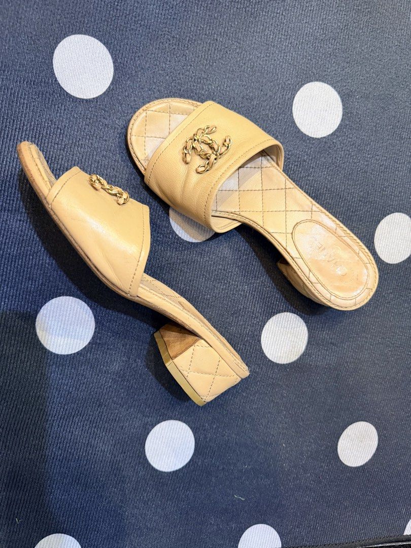 Authentic Chanel Beige Quilted CC Logo 35 Mules Sandals Size 36 (Category: Flats & Sandals) located in Dumaguete. Submitted by lovebags.ph (Listing ID 1462829393, Image 3). Description: - Authentic Chanel mules in elegant beige. - Features the signature CC logo on the strap. - Luxurious quilted detailing on the footbed and heel. - Convenient slip-on style for easy wear. - Moderate heel height for comfort and style. - Expertly crafted in Italy..