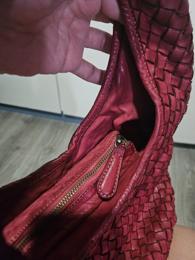 Authentic Italian Leather Bag (Category: Shoulder Bags) located in Manila. Submitted by adaptingminimalism (Listing ID 1462738793, Image 2). Description: - Distressed Italian Leather - Woven hobo bag - Secure zipper closure - Interior zippered pocket for organization - Spacious design, ideal for everyday carry - High-quality bought from Samu't Sari Its Mae's Choice (FB).