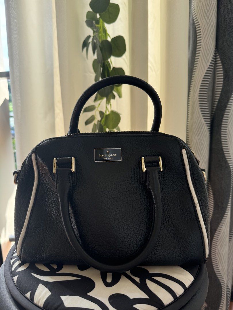 Authentic Kate Spade Black Leather Satchel Bag with Strap Two-Way Medium (Category: Luxury Bags & Wallets) located in Paranaque City. Submitted by discountstoremanila (Listing ID 1462837643, Image 2). Description: ➡️ Black pebbled leather Kate Spade satchel ➡️ White piping detail along the sides ➡️ Gold hardware ➡️ Includes a detachable crossbody strap ➡️ Minor scuffs on leather, especially near top handle attachment ➡️ Best for petite body frame