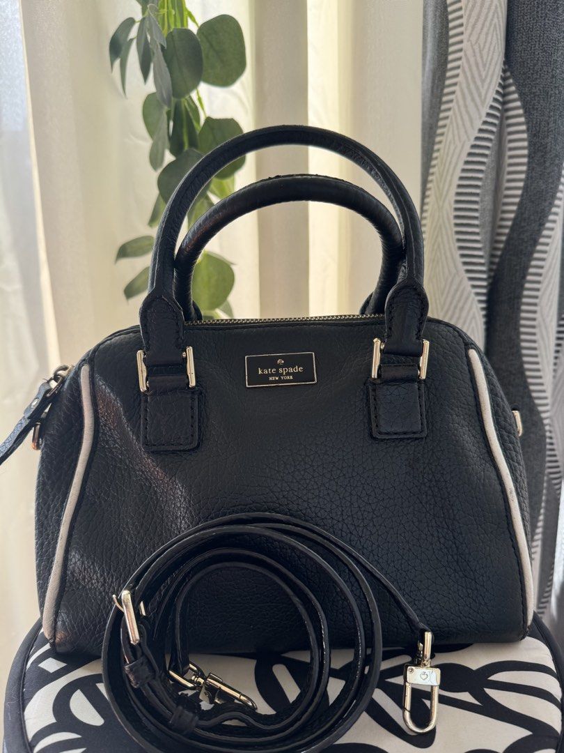 Authentic Kate Spade Black Leather Satchel Bag with Strap Two-Way Medium (Category: Luxury Bags & Wallets) located in Paranaque City. Submitted by discountstoremanila (Listing ID 1462837643, Image 1). Description: ➡️ Black pebbled leather Kate Spade satchel ➡️ White piping detail along the sides ➡️ Gold hardware ➡️ Includes a detachable crossbody strap ➡️ Minor scuffs on leather, especially near top handle attachment ➡️ Best for petite body frame