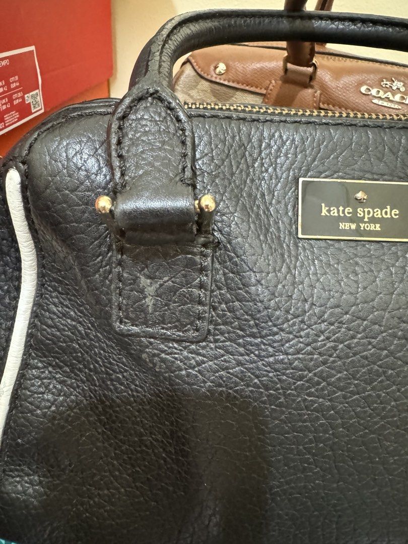 Authentic Kate Spade Black Leather Satchel Bag with Strap Two-Way Medium (Category: Luxury Bags & Wallets) located in Paranaque City. Submitted by discountstoremanila (Listing ID 1462837643, Image 3). Description: ➡️ Black pebbled leather Kate Spade satchel ➡️ White piping detail along the sides ➡️ Gold hardware ➡️ Includes a detachable crossbody strap ➡️ Minor scuffs on leather, especially near top handle attachment ➡️ Best for petite body frame