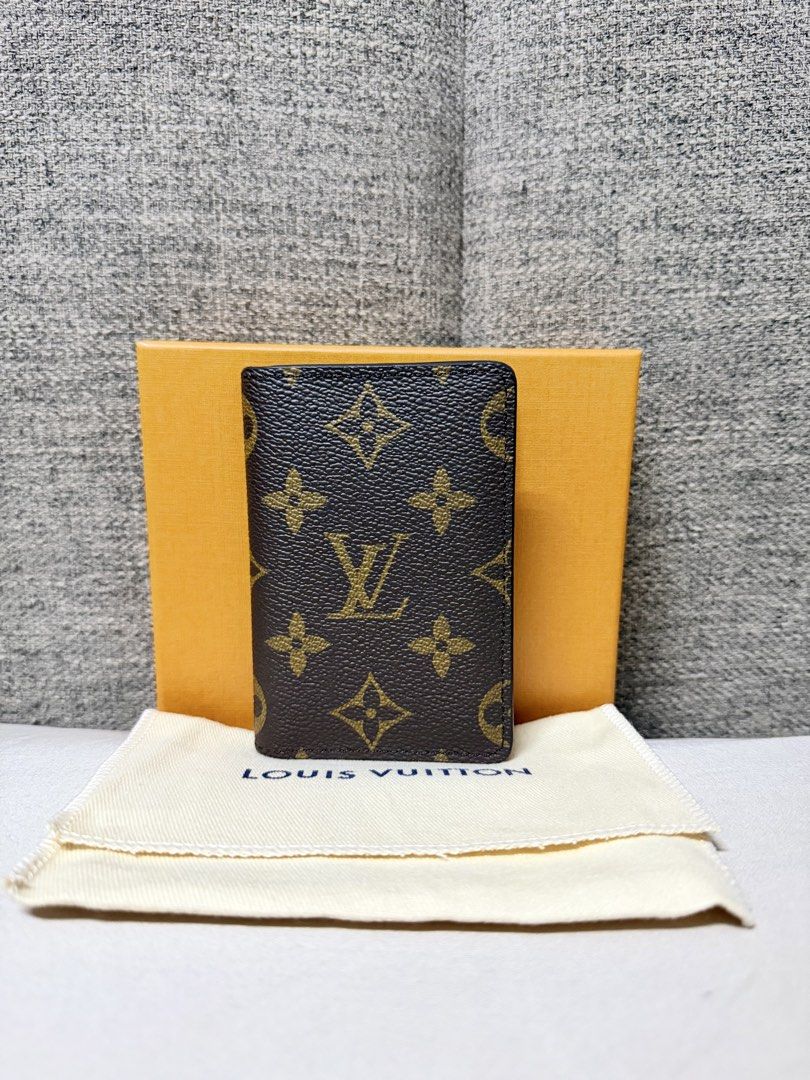 Authentic Louis Vuitton Pocket Organizer Monogram (Category: Luxury Bags & Wallets) located in Paranaque City. Submitted by angelibermejo (Listing ID 1462802410, Image 2). Description: 7.5 x 11.1 x 1 cm (Length x Height x Width) - Coated Canvas - Calf Leather lining - 5 interior pockets - 1 exterior pocket - 3 credit cards slots - Cowhide leather lining Used for a few times only. No issues or flaws. RFS: Got a new wallet.