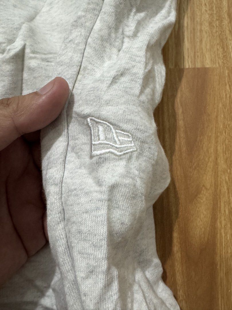 Authentic New Era Essential Light Gray Fleece Jogger (Category: Joggers) located in Badian. Submitted by choloknows (Listing ID 1462826827, Image 3). Description: Good as New 10/10 Size XL on tag Best fit 34-38 Waistline Length: 39 Minor issue: washable yellow stains only (see last picture) 680 + sf.