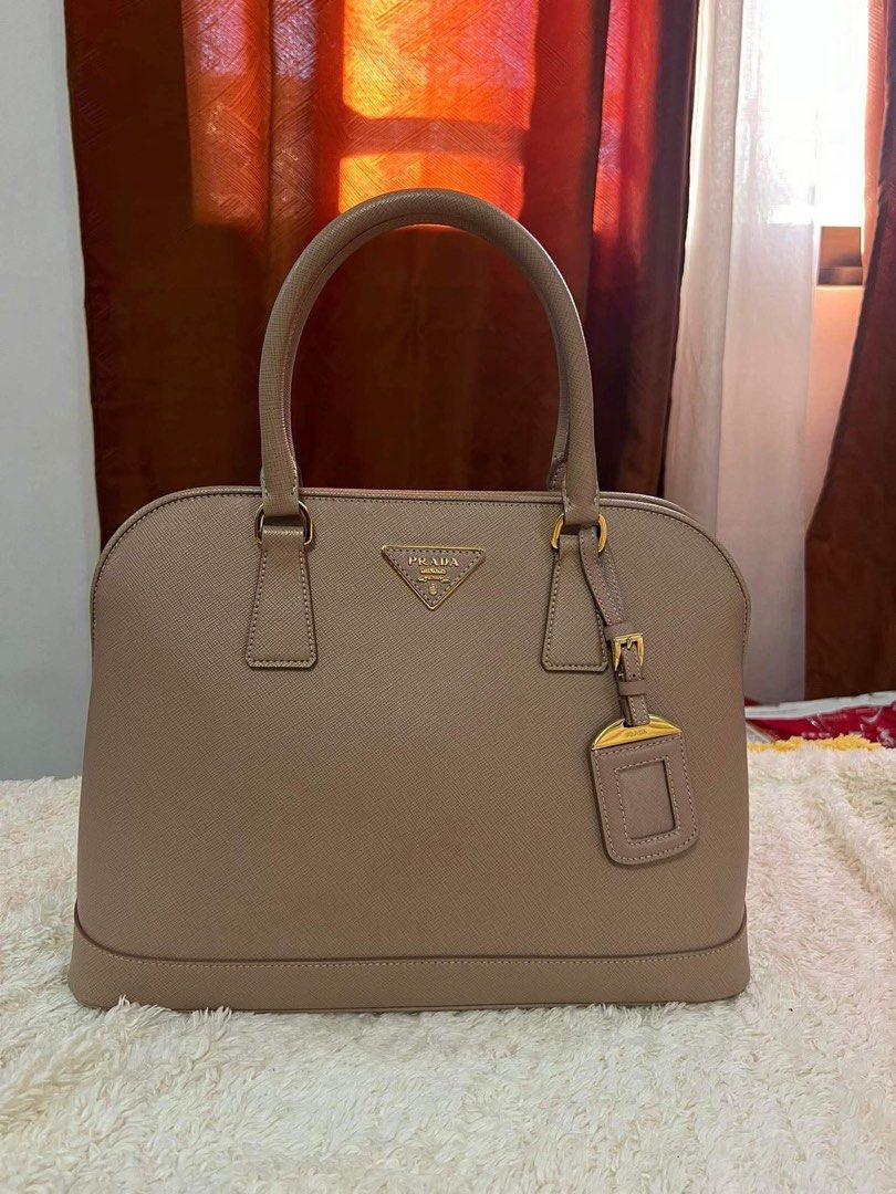Authentic Prada Promenade (Category: Luxury Bags & Wallets) located in Quezon City. Submitted by beayuvienco (Listing ID 1462722332, Image 1). Description: .