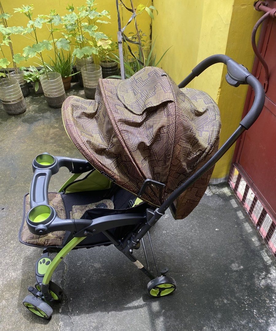 Baby Stroller with Canopy and Cup Holders (Category: Strollers) located in Quezon City. Submitted by natesm (Listing ID 1462741901, Image 2). Description: - Lightweight and easy to carry - Canopy for sun protection - Two cup holders on the tray - Secure harness for safety - Swivel wheels for easy maneuvering - Folds compactly for storage - Ideal for everyday trips.