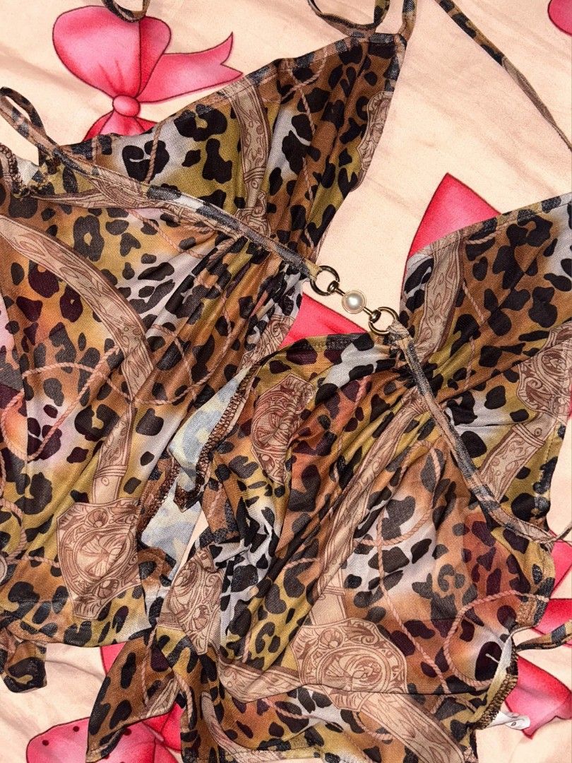 Backless Self-Tie Top in Leopard print | small (Category: Bikinis & Swimsuits) located in Makati City. Submitted by cher._. (Listing ID 1462820475, Image 1). Description: •backless self tie top •shear material price negotiable.