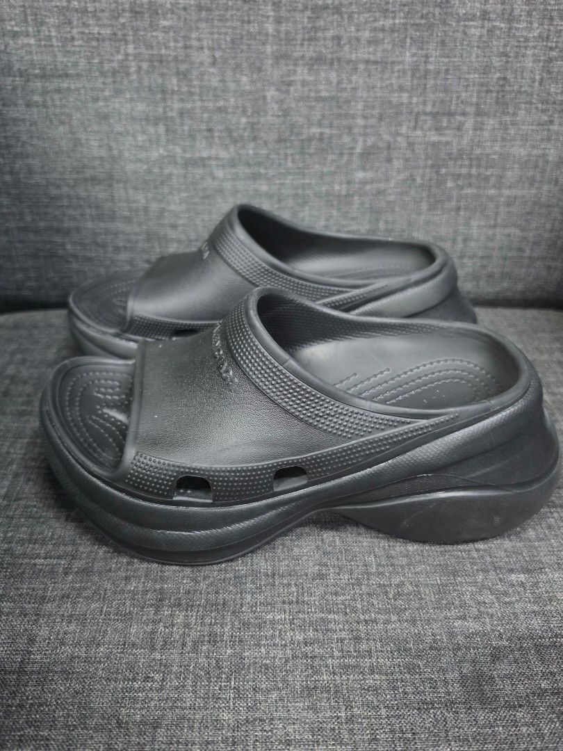 Balenciaga Black Slides (Category: Wedges) located in General Trias. Submitted by roselle2230 (Listing ID 1462832558, Image 3). Description: - Classic black Balenciaga slides - Features prominent Balenciaga logo on the strap - Comfortable and easy slip-on design - Textured grip sole for stability - Ideal for casual outings or post-workout wear - Genuine "Made in Italy" craftsmanship.