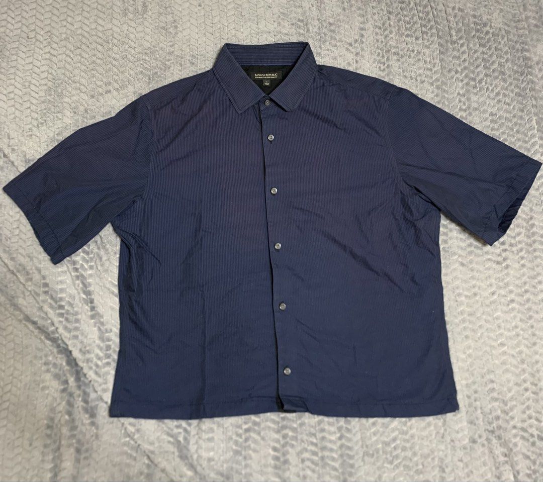 BANANA REPUBLIC NAVY BLUE POLO (Category: Formal Shirts) located in Bacolor. Submitted by mllrigwy (Listing ID 1462823133, Image 1). Description: ₱299 + sf Length 24 inch Waist/Width 22 inch Mop: gcash only! Large on tag Loc: Pampanga Color may vary due to lighting Payment First! Fixed price .