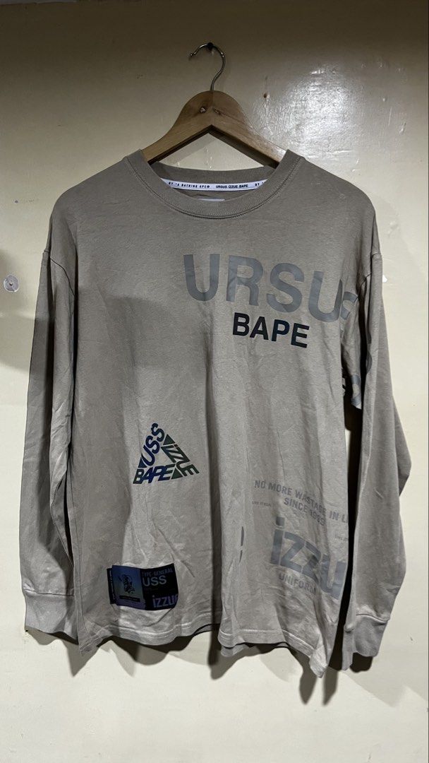 BAPE URSUS IZZUE Long Sleeve Tee Size M (Category: Tshirts & Polo Shirts ) located in Tacloban City. Submitted by rxluminoque (Listing ID 1462703585, Image 1). Description: - BAPE x URSUS IZZUE Collaboration Long Sleeve T-Shirt - Features eye-catching graphic prints on both front and back - Made from comfortable and breathable 100% cotton - Size: Medium (M) Dimes 22.5x28 - A must-have addition to any streetwear collection Minor Issue: See last 2 