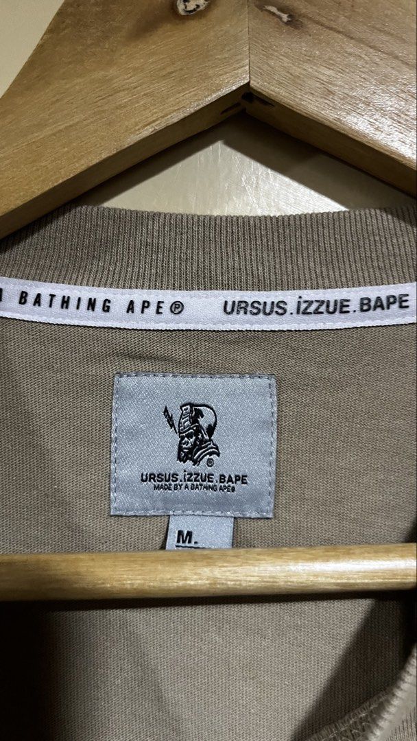 BAPE URSUS IZZUE Long Sleeve Tee Size M (Category: Tshirts & Polo Shirts ) located in Tacloban City. Submitted by rxluminoque (Listing ID 1462703585, Image 3). Description: - BAPE x URSUS IZZUE Collaboration Long Sleeve T-Shirt - Features eye-catching graphic prints on both front and back - Made from comfortable and breathable 100% cotton - Size: Medium (M) Dimes 22.5x28 - A must-have addition to any streetwear collection Minor Issue: See last 2 