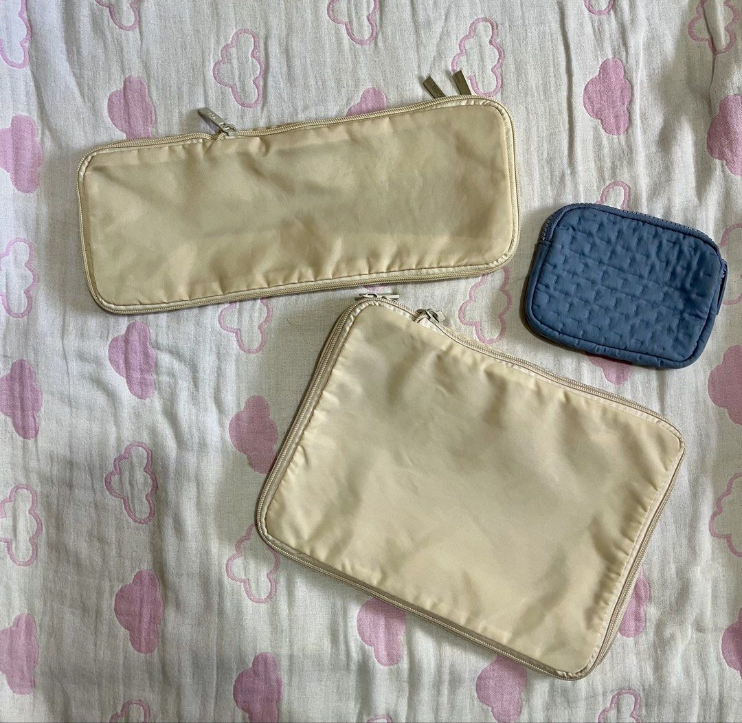BASH BUNDLE packing cubes and passport holder (Category: Purses & Pouches) located in Taguig. Submitted by u.sell (Listing ID 1462724140, Image 2). Description: 2 packing cubes in cream (1 small, 1 medium) 1 passport holder TAKE ALL for 600 RFS: i bought new set 📍 taguig, lalamove/grab/j&t.