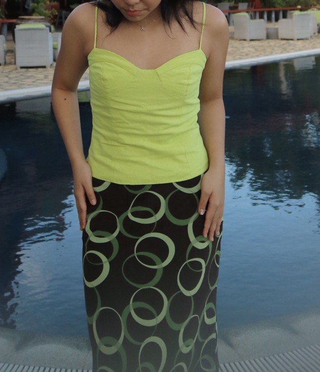 Bea’s closet - Lime Green Bustier Cami Top (Category: Sleeveless) located in Mandaluyong City. Submitted by yv.stuff (Listing ID 1462769053, Image 2). Description: - Cute lime green cami top - Sweetheart neckline with structured bust - Thin spaghetti straps - Versatile: pairs well with skirts or pants - Comfortable and breathable fabric - Suitable for casual outings or dressing up.