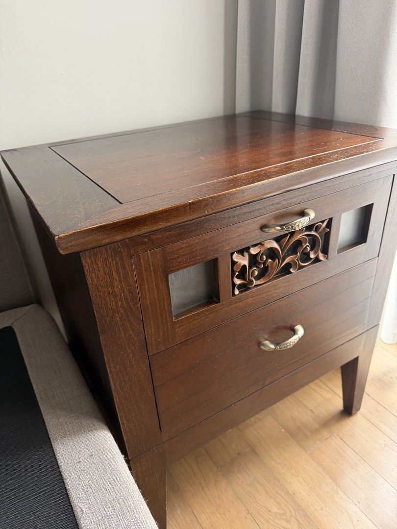 Side table bed (Category: Other Home Furniture) located in Singapore. Submitted by littlescooter123 (Listing ID 1462711080, Image 2). Description: Bed side table in good condition. Solid wood Collection only. Postal code 258005 .