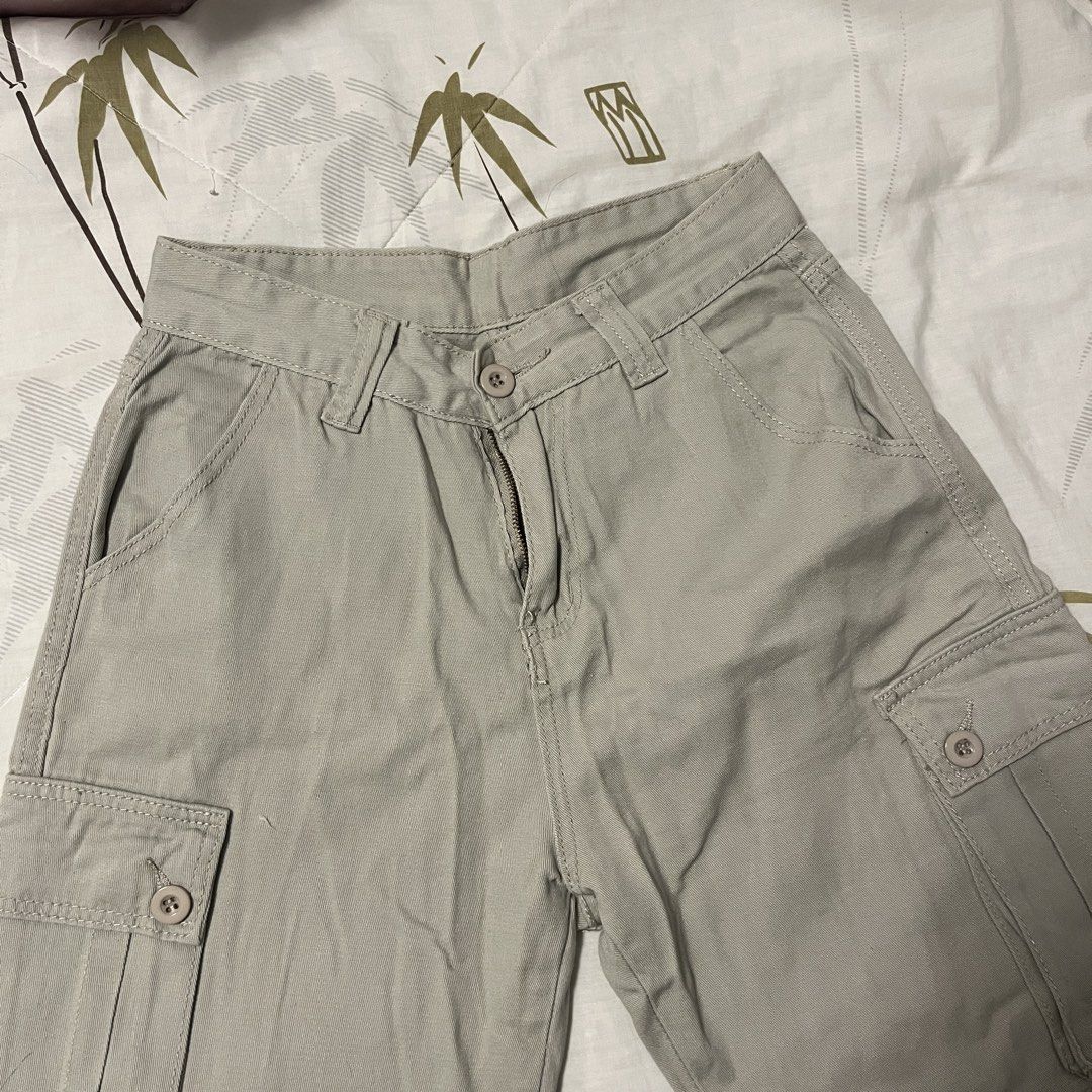 Beige Low Waist Cargo Pants (Category: Other Bottoms) located in Las Pinas. Submitted by thevallerys (Listing ID 1462827280, Image 3). Description: - Beige cargo pants - Multiple pockets - Fits size 25 - Fits petite height girls, had it altered to my height - Button and zip closure - Wide leg fit.