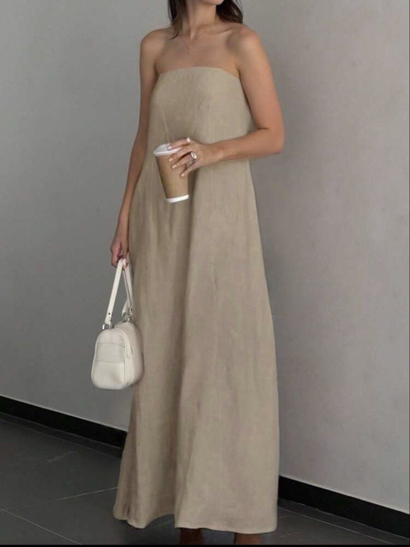 Beige Strapless Maxi Dress with side Pockets (Category: Dresses) located in Iloilo. Submitted by dabyladaby2 (Listing ID 1462815224, Image 1). Description: - Flowy strapless maxi dress - Neutral beige tone - Simple and chic design - Ideal for casual days or beach vacations - Comfortable and lightweight fabric - Easy to accessorize for different looks With side pockets - bust 24in ( smocked back) , length 37in.