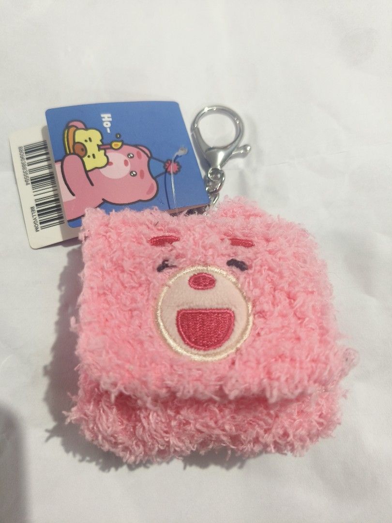 Bellygom Fuzzy Earphonr Key ring Pouch (Category: Other Stationery & Craft) located in San Jose del Monte. Submitted by m_nshop (Listing ID 1462781094, Image 1). Description: - Adorable pink bear plush pouch - Features a convenient keychain clip - Perfect for storing small items like coins or earbuds - Secure velcro closure - Easily attachable to bags or backpacks - Ideal for kids and fans of cute accessories payment first jnt or lalamove courier