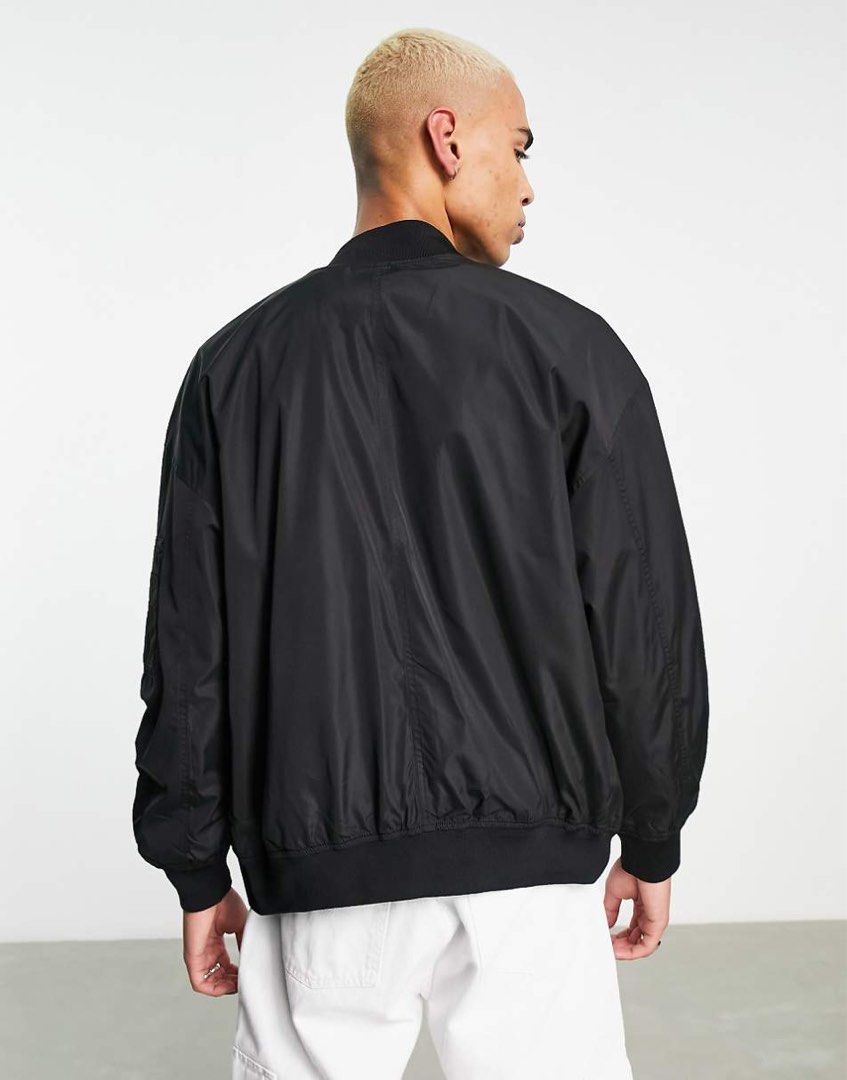 Bershka Black Bomber Jacket (Category: Coats, Jackets and Outerwear) located in Caloocan City. Submitted by declutteringph. (Listing ID 1462805516, Image 2). Description: Size M on the tag! Dimensions: (inches) Shoulder width: 17” Bust width: 22” Body Length: 26” Sleeves Length: 25”.