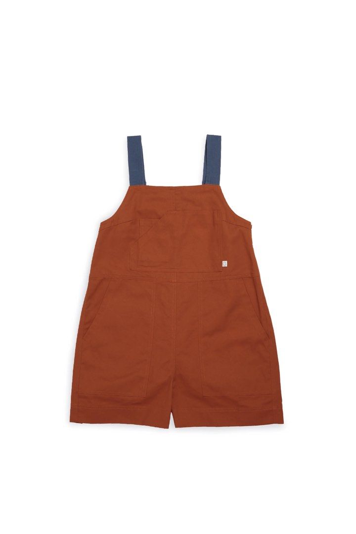 Beyond the Vines Utility Jumpsuit/Romper (Shorts) (Category: Jumpsuits) located in Manila. Submitted by poppymart0525 (Listing ID 1462687712, Image 2). Description: Beyond the Vines viral utility jumpsuit in orange, size Medium. Bought in Singapore and worn only once. Retails for around P4.9k .