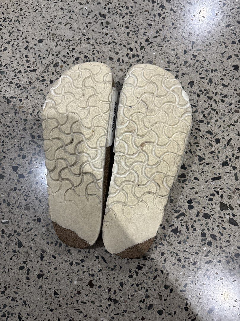 Birkenstocks size 35 (Category: Flats & Sandals) located in Manila. Submitted by everythingwlove (Listing ID 1462819243, Image 2). Description: - White leather Birkenstock sandals - Comfortable cork footbed - Adjustable buckle closure - Soles show some wear - Ideal for everyday comfort.